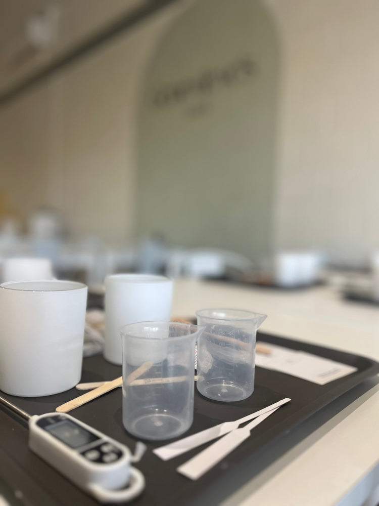 candle making workshop - tray with beckers and equipment for the workshops